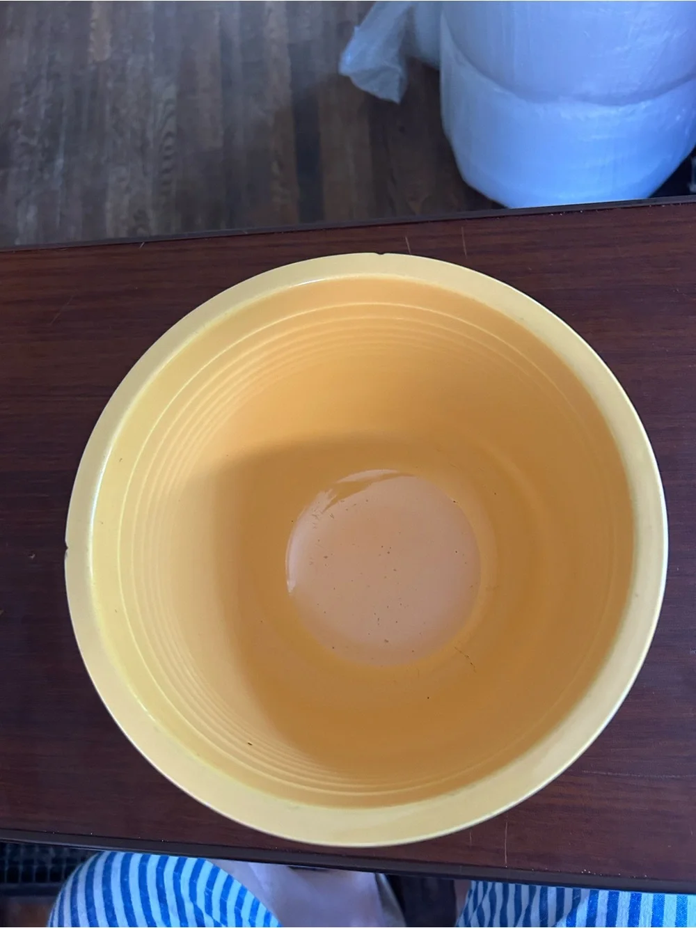 Vintage fiestaware yellow mixing bowl two chips on the rim, 8 3/4”wide x 6 1/2”